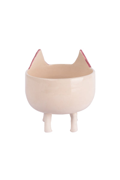 pot with a smiling cat figure. cat's ears are in pink colour.