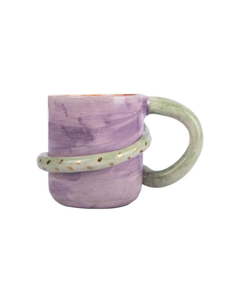 purple colour mug. there is an eye on it and its holder snake figure and wrapping around the cup back