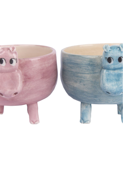 pink and blue coloured happy faced hippopotamus figured pot