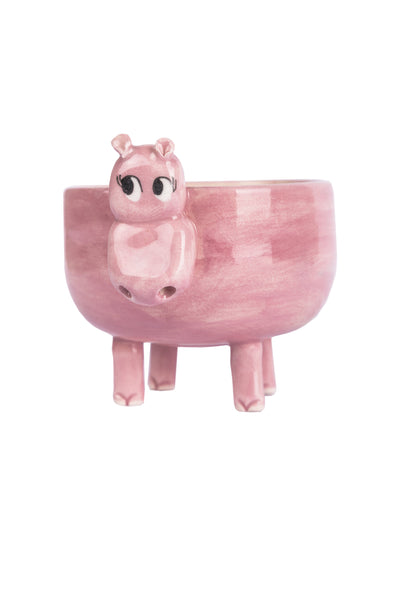 pink coloured happy faced hippopotamus figured pot