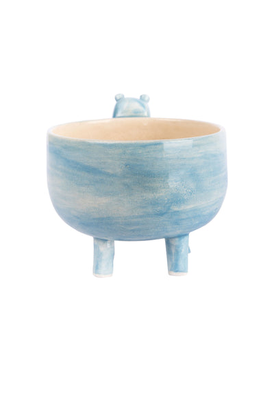 blue coloured happy faced hippopotamus figured pot back