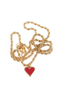 necklace with red coloured heart shaped pendant