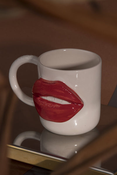 Red coloured lip figured cup