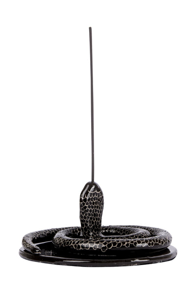 snake shaped incense burner with plate under it in black colour