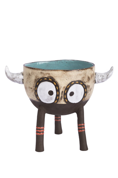  figure with two big eyes, two horns and three feet pot bowl